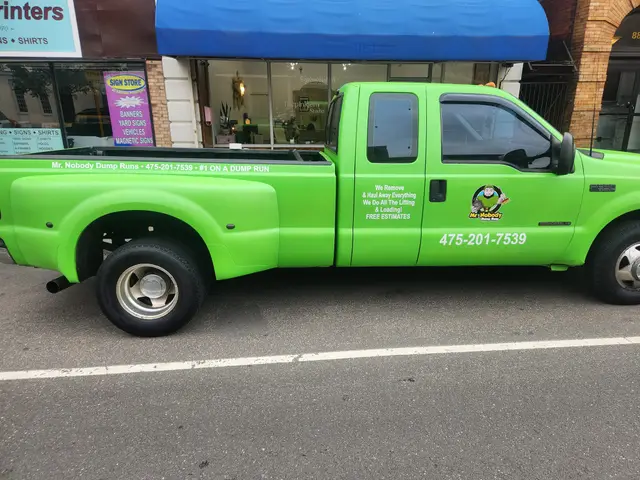 Bright green Mr. Nobody Dump Runs pickup truck parked on a street